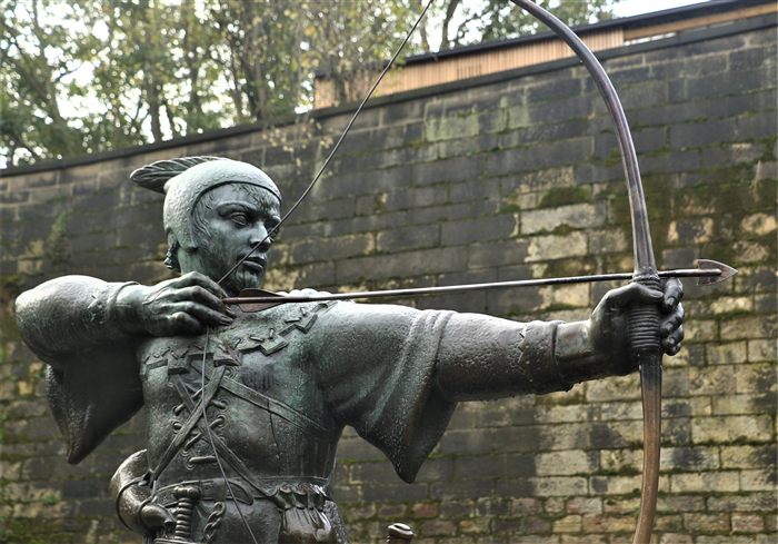 The Robin Hood statue at Nottingham Castle, drawing his bow