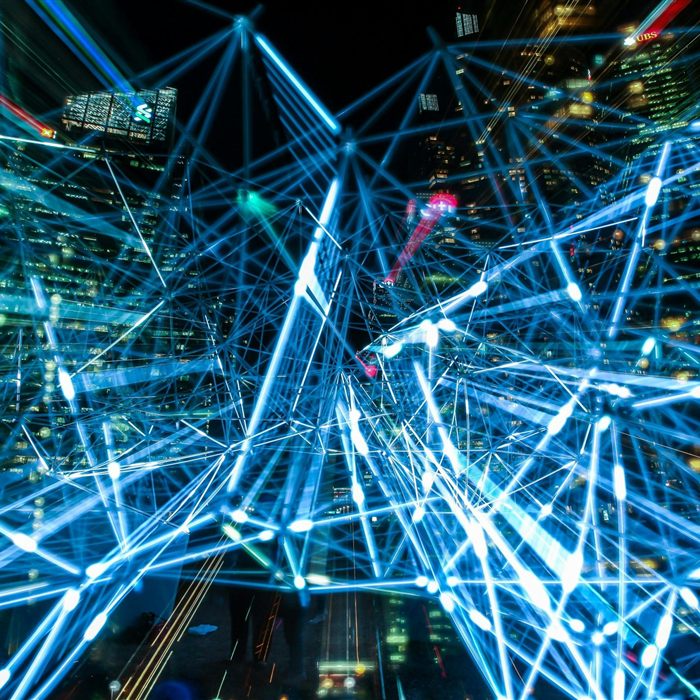 Abstract network of connected data points representing AI systems