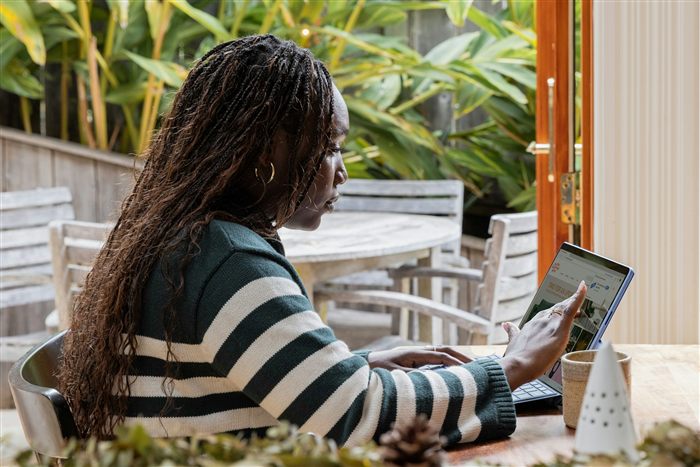 Team member working through training material on a tablet